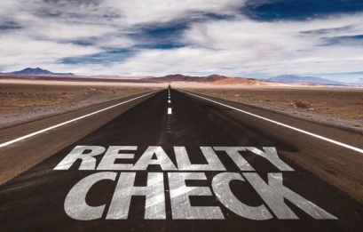 Reality Check Written On Desert Road