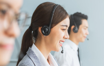 Banner Asian Team Call Center, Customer Service, Telesales In Casual With Headset Or Headphone And Look At Camera