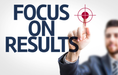 Business Man Pointing The Text: Focus On Results